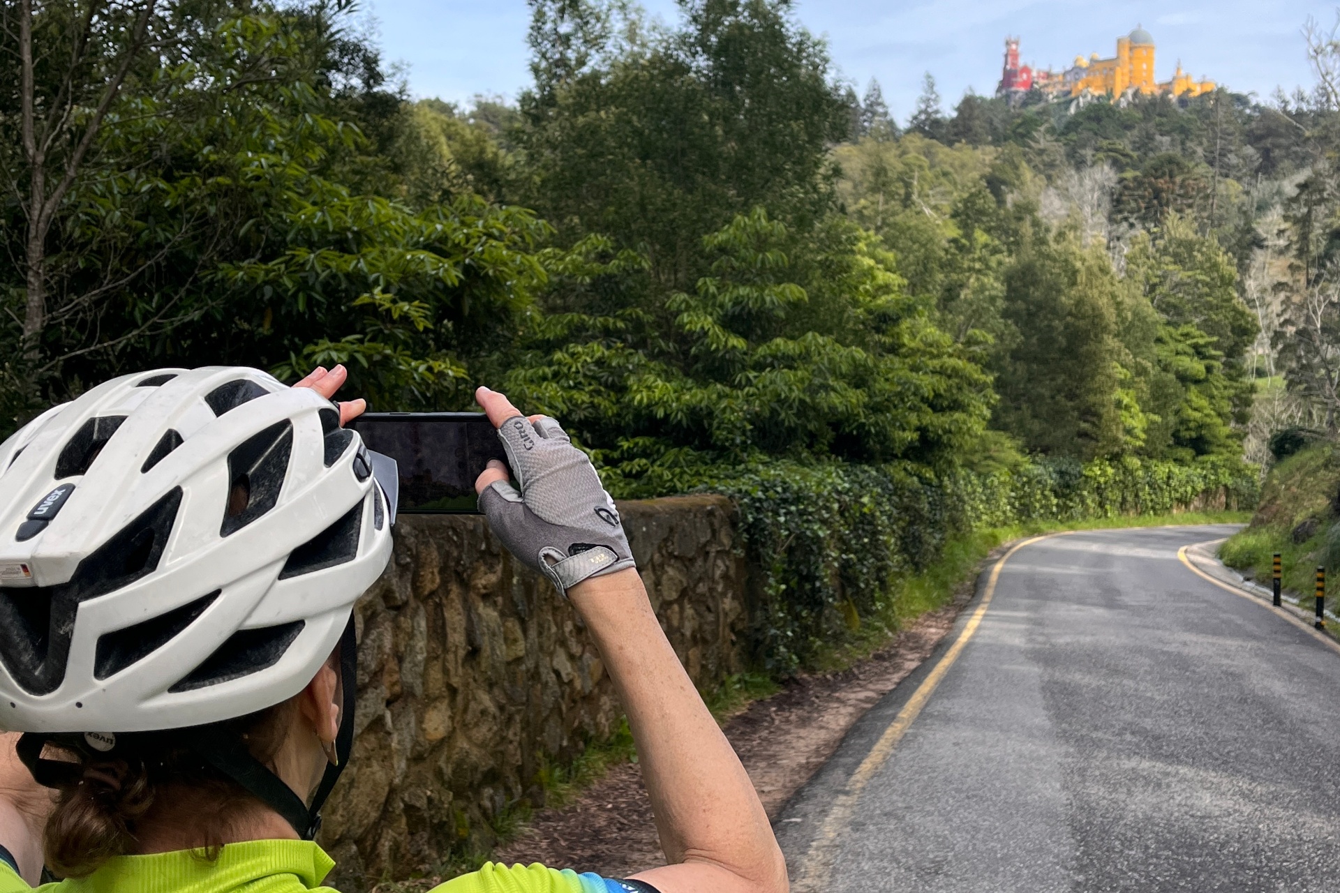 Rider on a Sintra-Cascais hilltop trail overlooking the Atlantic coast